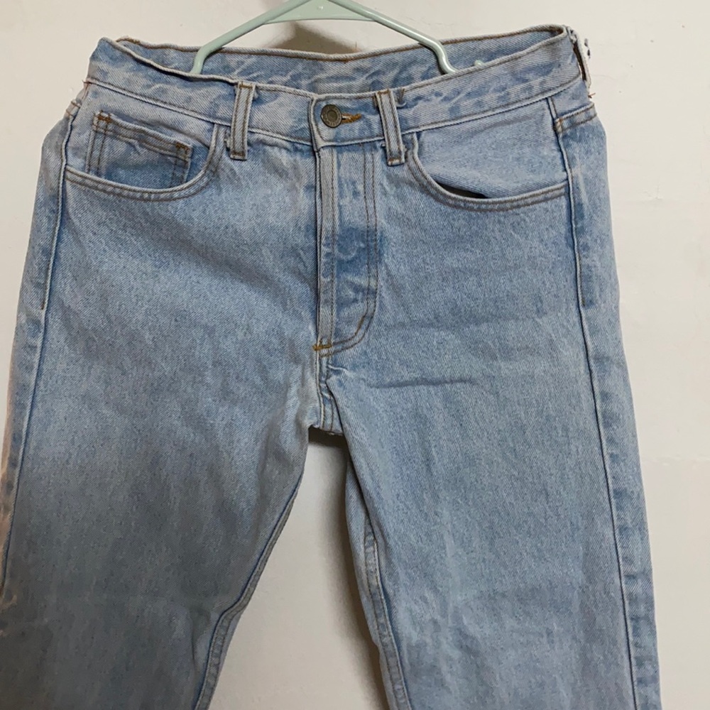 Light wash jean with raw hem